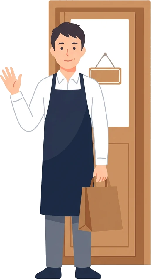 店の入口で、紙袋を持って手を振る店主